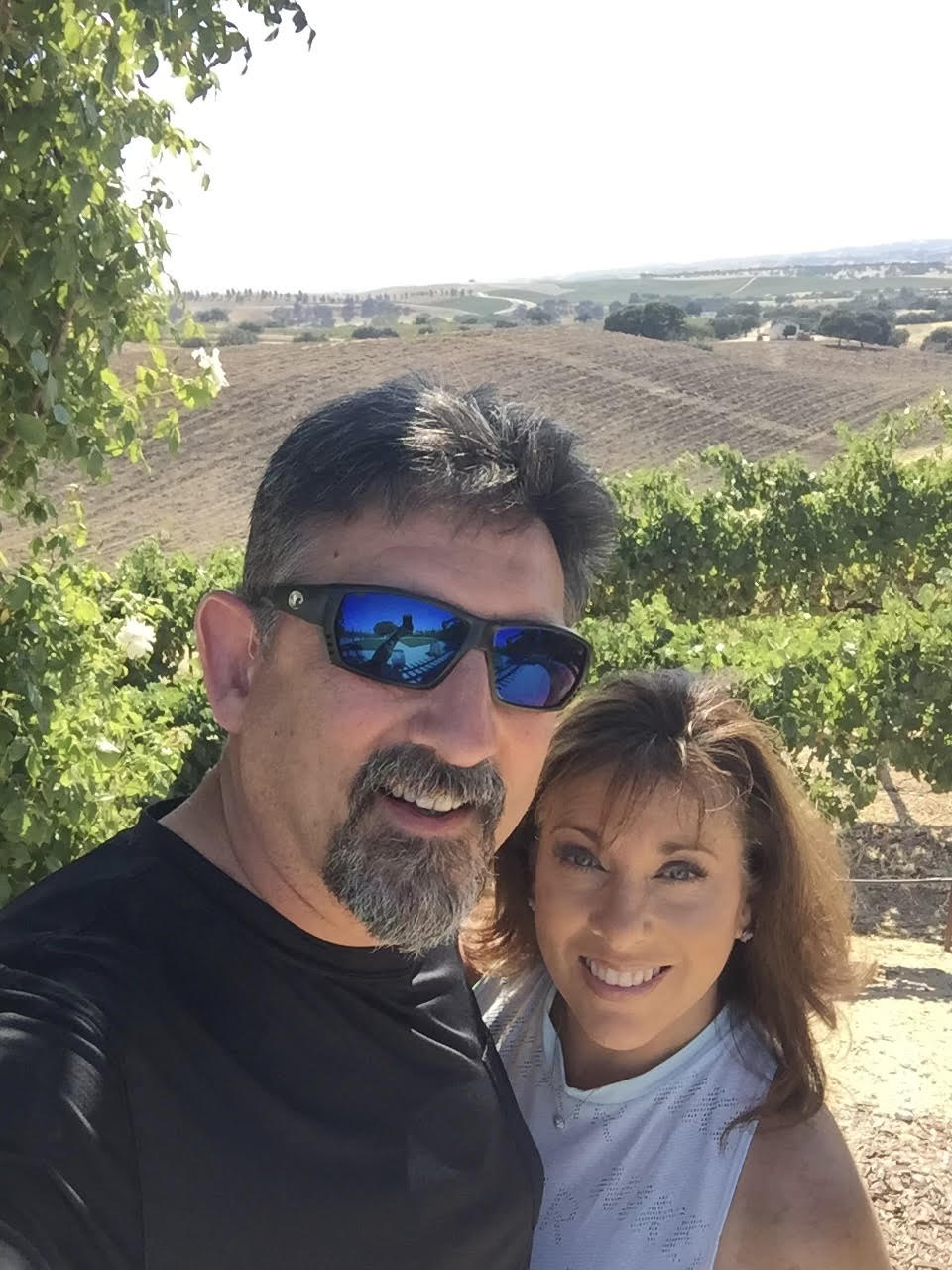 Michael Elerick with his wife Trish with a vineyard in the background.